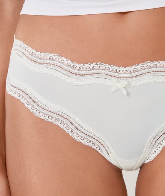 Tanga con bordes de encaje de microfibra;${refinementColor}