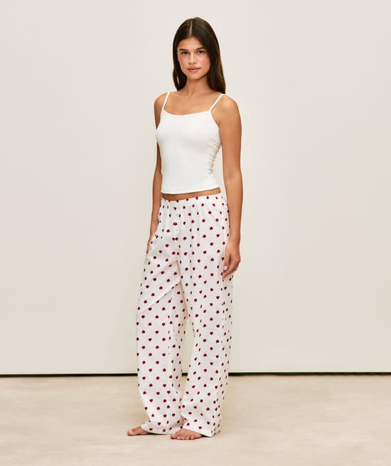Strawberry print poplin trousers;