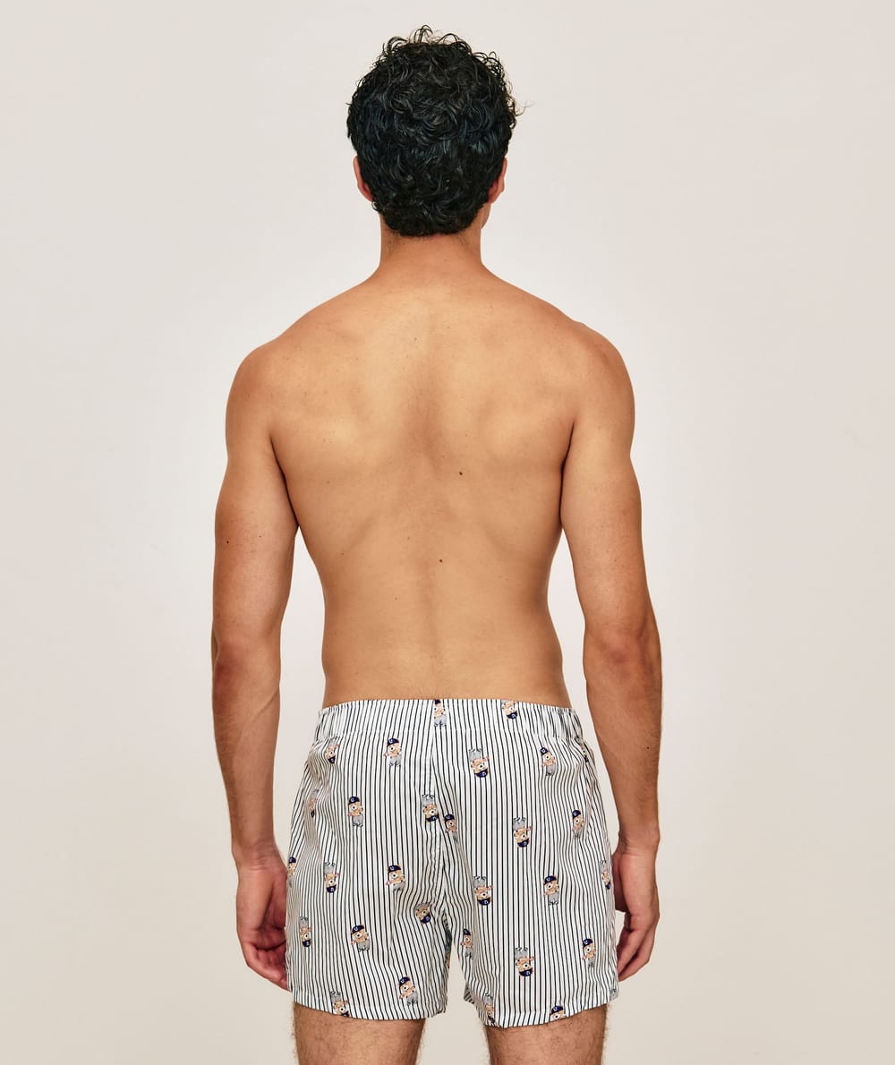 Striped cotton boxer shorts with bear patterns;