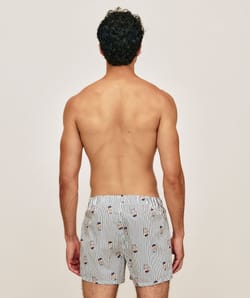Striped cotton boxer shorts with bear patterns;