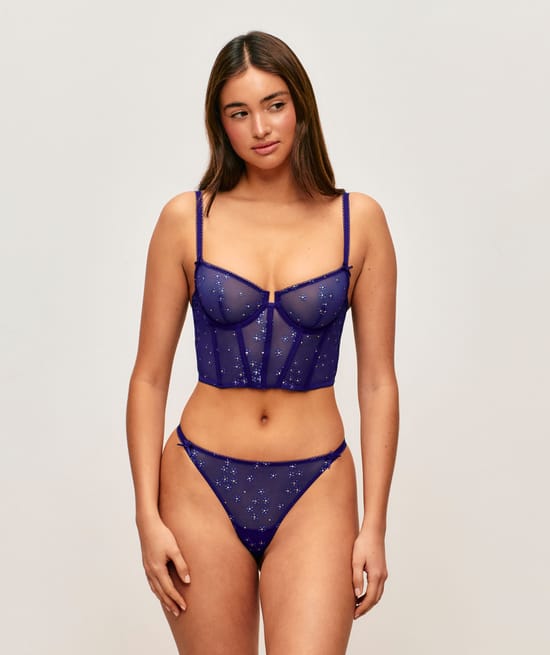 Tulle bustier with glitter flower patterns;