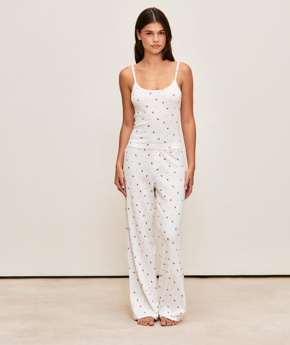 Lace panel pants with floral print;