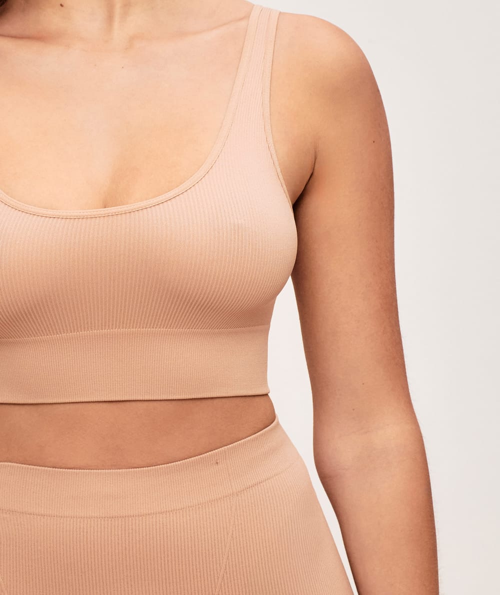 Ribbed seamless bralette in nude;