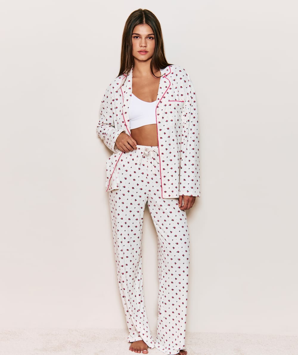 Ribbed jersey trousers with floral pattern;