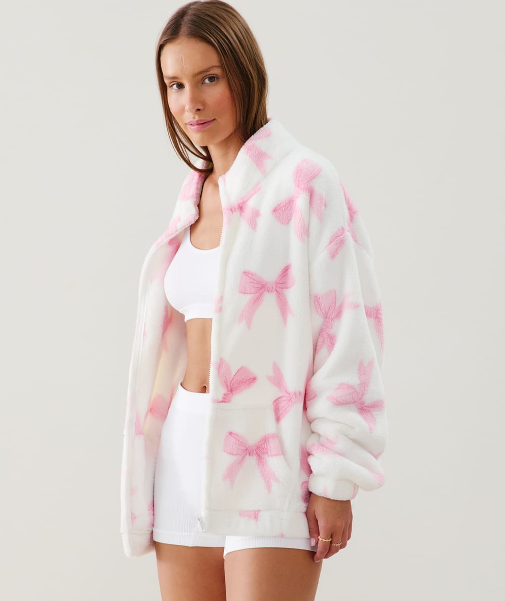 Fleece jacket with bow pattern;