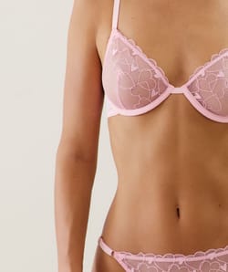 Balconette bra with embroidered heart patterns;
