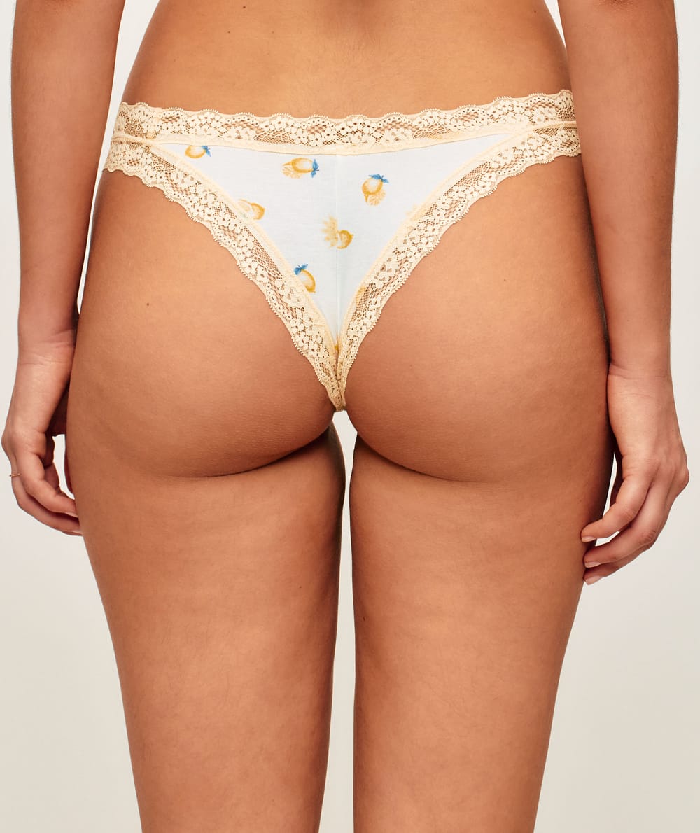 Cotton and lace thong with lemon patterns;