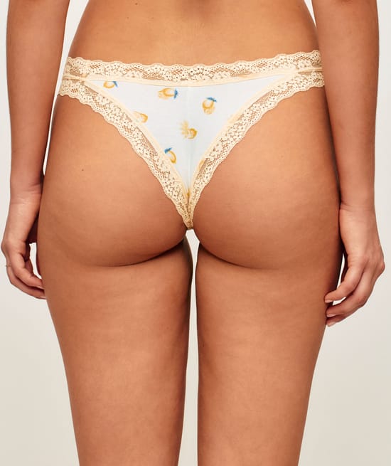Cotton and lace thong with lemon patterns;