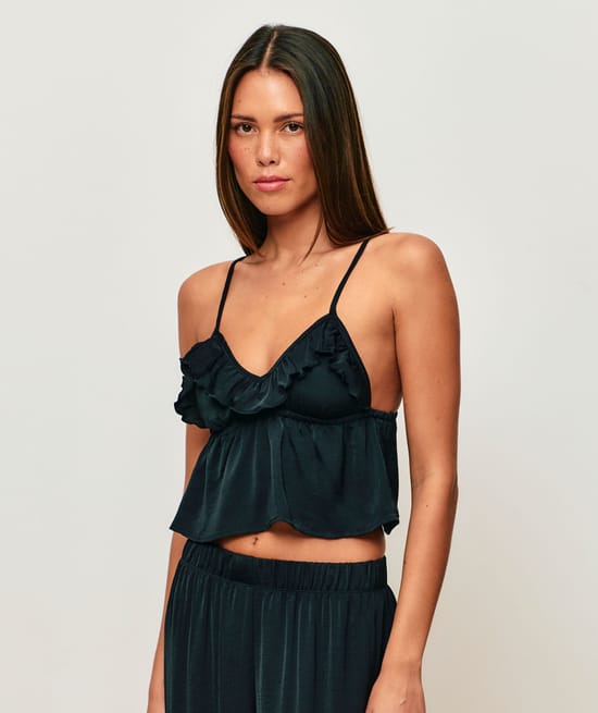 Satin crop top with V-neck, thin straps, and ruffles;