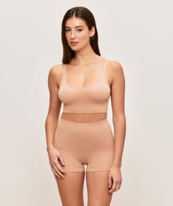 Ribbed seamless bralette in nude;