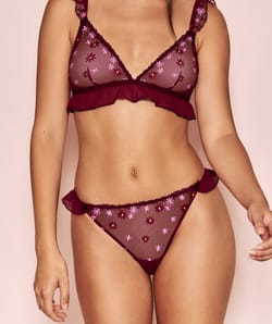 Brief with embroidered floral patterns;