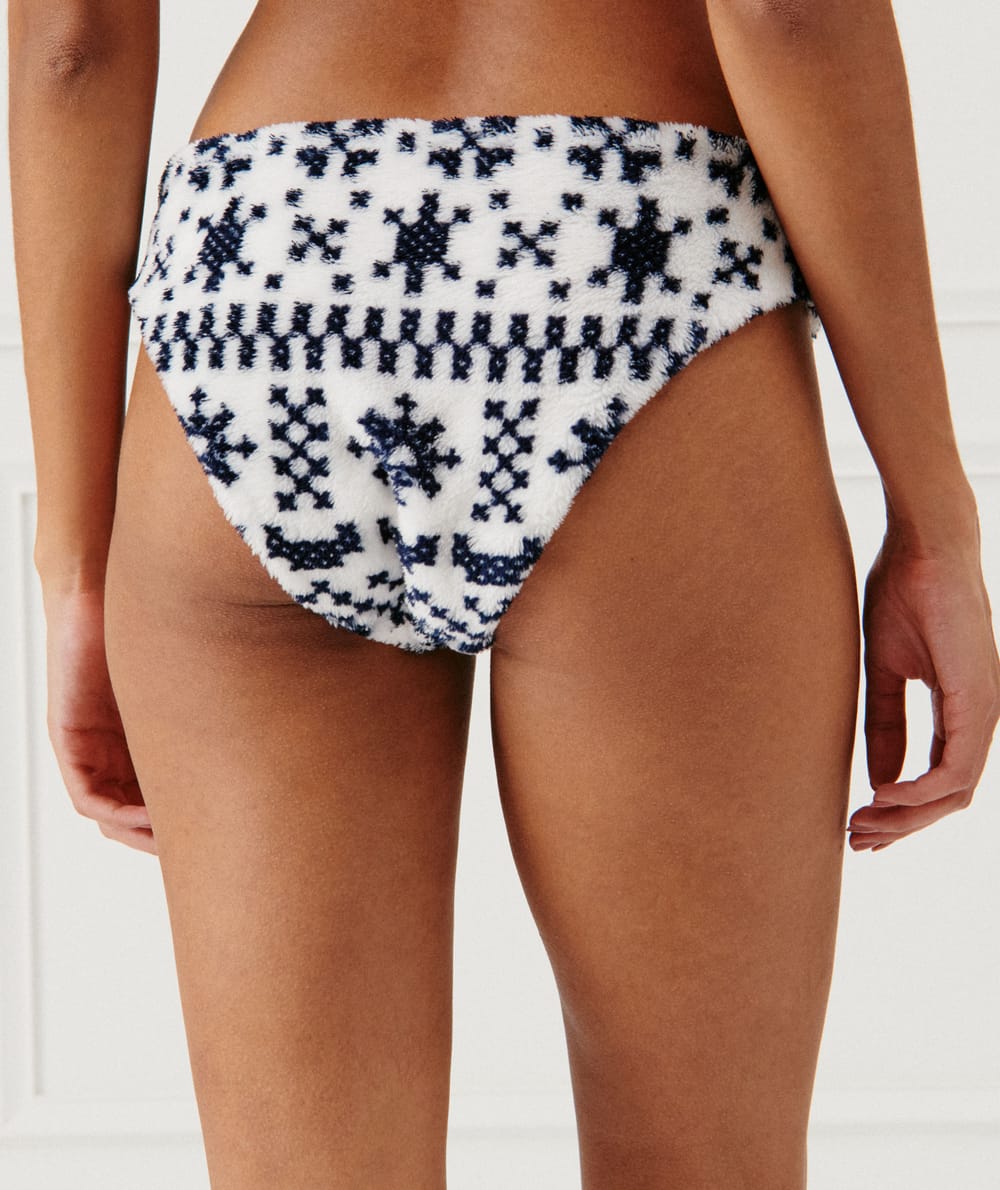 Braga polar con motivos de Navidad;