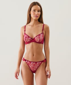 Balconette bra with embroidered floral patterns;