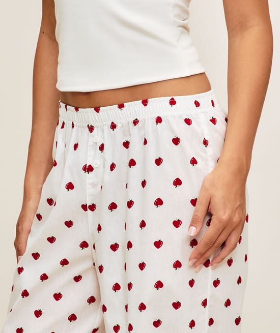 Strawberry print poplin trousers;