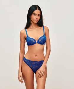 Lace demi-cup bra with sun jewel;