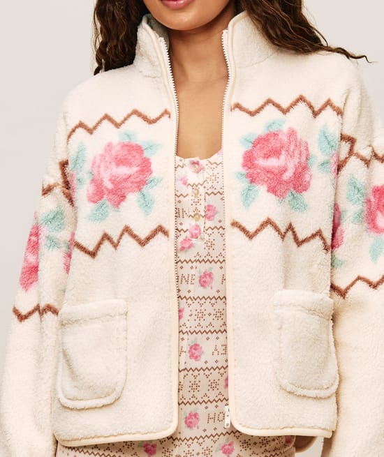 Floral patterned sherpa fleece jacket;