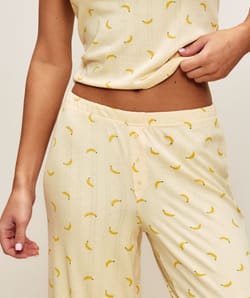 Corduroy jersey pants with banana patterns;