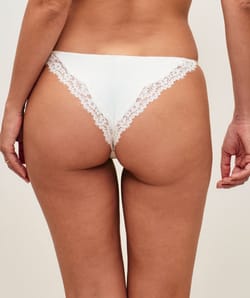 Jersey thong with lace and floral embroidery;