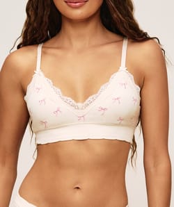 Triangle bra in seamless fabric and embroidered lace with bows;