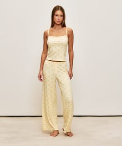 Corduroy jersey pants with banana patterns;