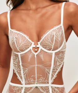 Embroidered mesh body with removable garters and pendant;