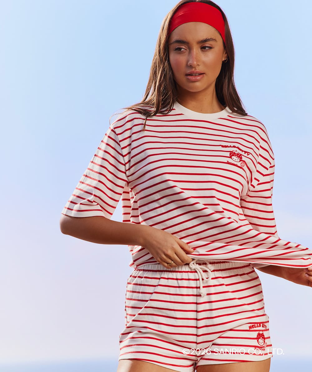 Short striped jersey with Hello Kitty embroidery;