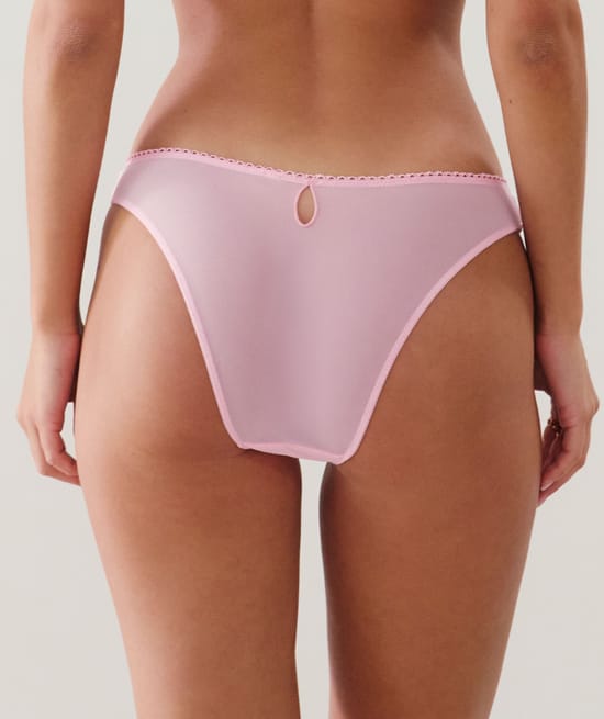 Brief with embroidered floral patterns;