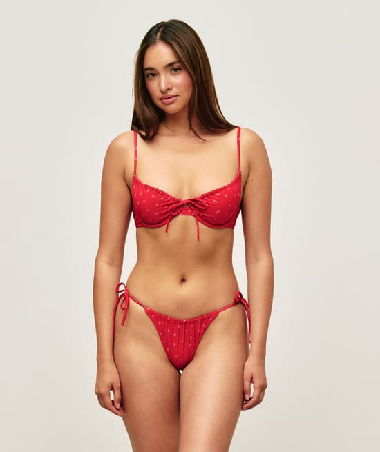 Bas de maillot de bain tanga avec motifs floraux;