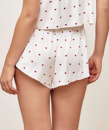 Satin shorts with heart pattern;