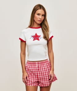 Crop top in jersey with star print and Playboy embroidery;