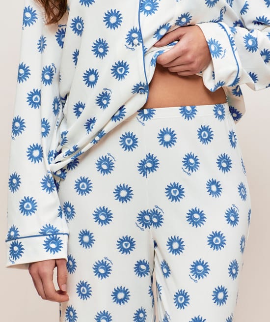 Pantalon en jersey c&ocirc;tel&eacute; motif soleil;