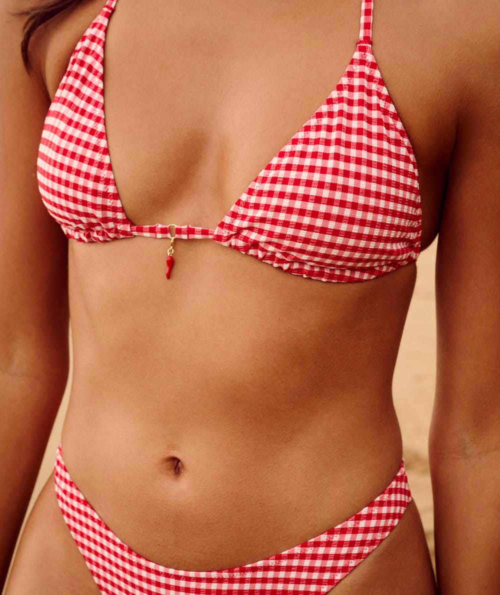 Triangle bikini top with textured gingham pattern and chili pendant;