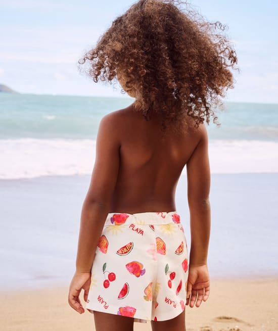 Kids' swimsuit shorts with fruity and floral pattern;