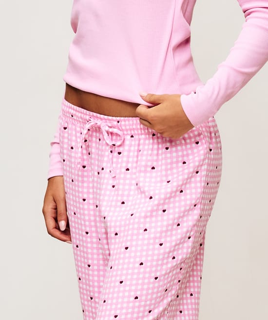 Printed flannel pants with checkered pattern and hearts;