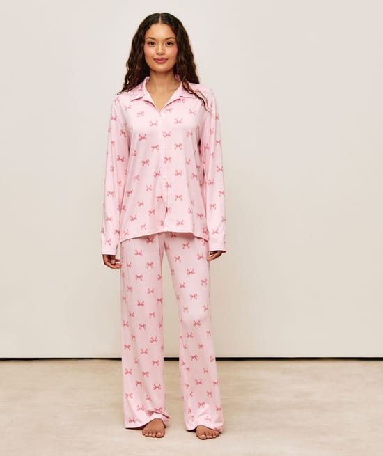 Striped shirt and pants set with tiny bows;