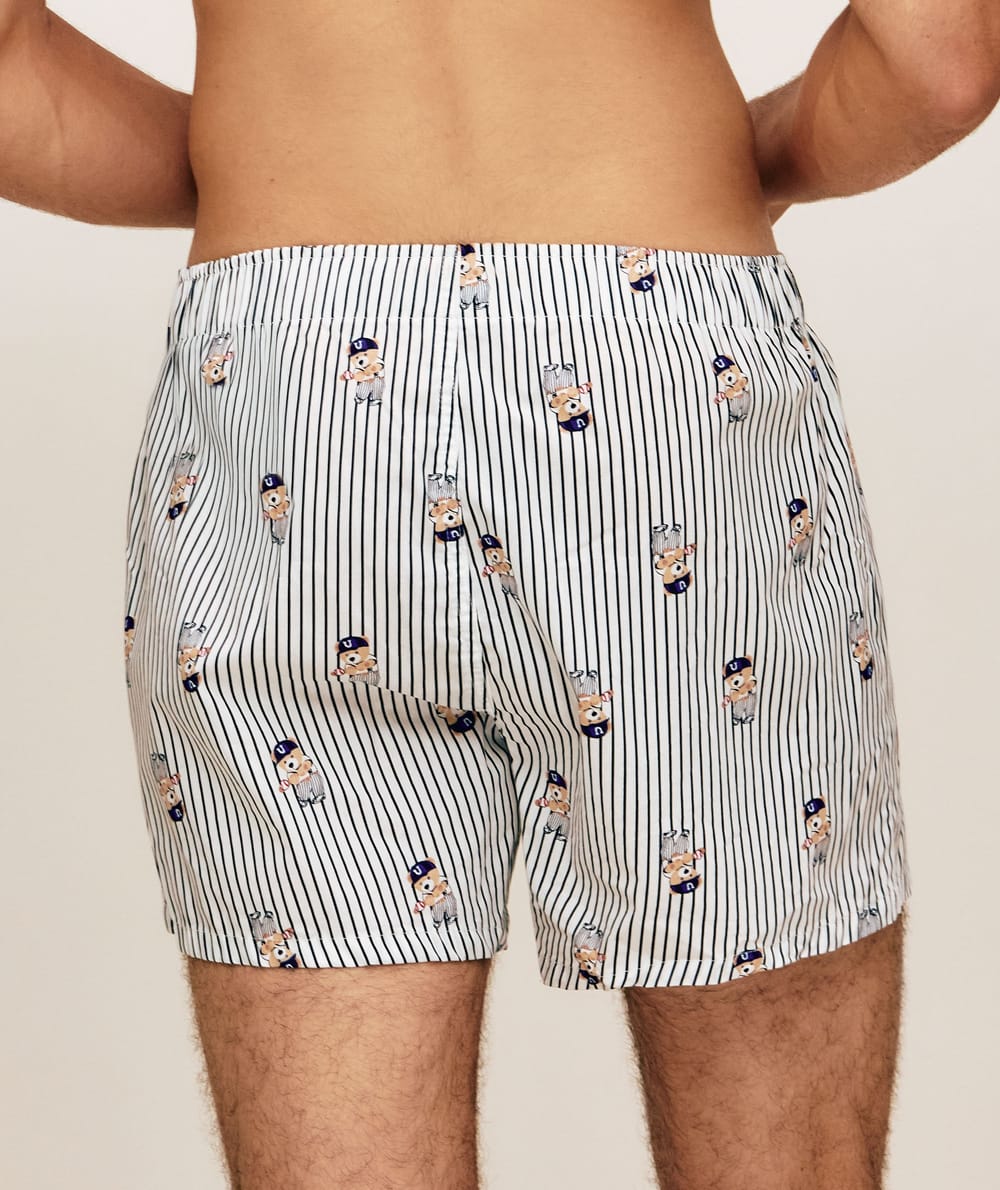 Striped cotton boxer shorts with bear patterns;