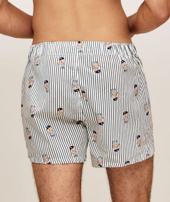 Striped cotton boxer shorts with bear patterns;