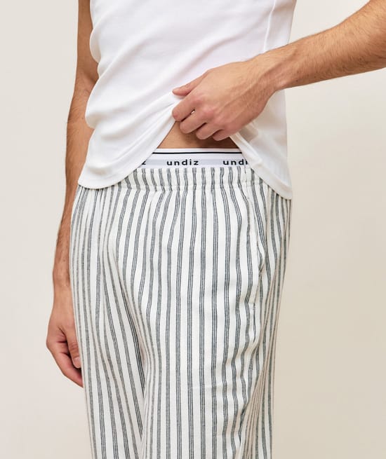 Striped flannel trousers;