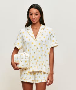 Jersey pouch with sun and lemon patterns;