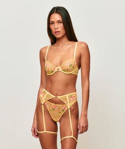 Underwire bra in tulle with floral embroidery and flower jewelry;