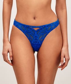 Mesh string with floral embroidery;