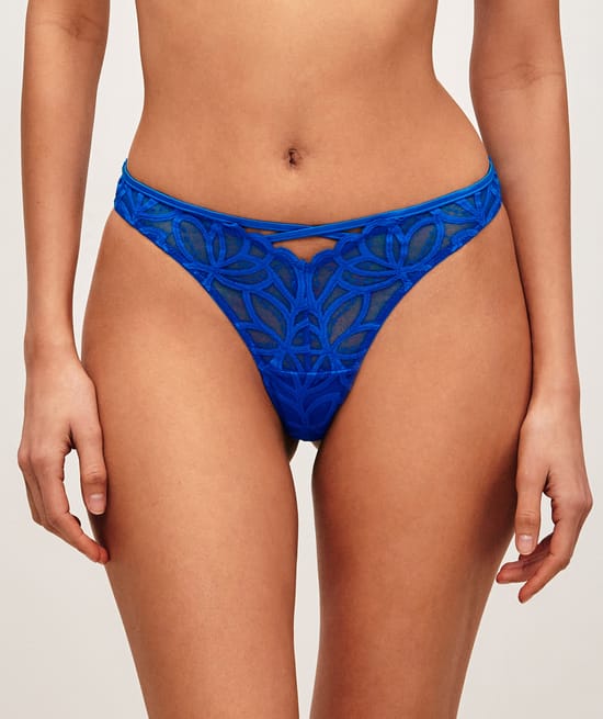 Mesh string with floral embroidery;