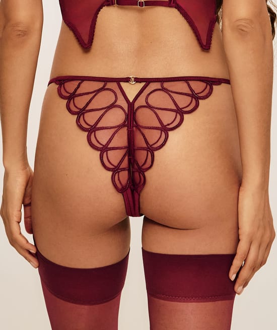 Tanga fendu en mesh brod&eacute; et satin;