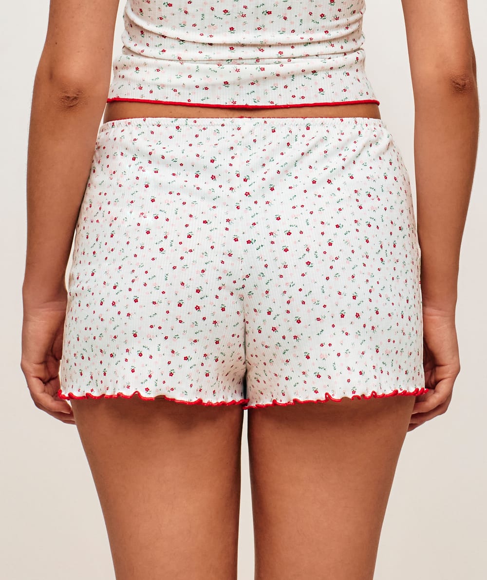 Jersey shorts with flower patterns;