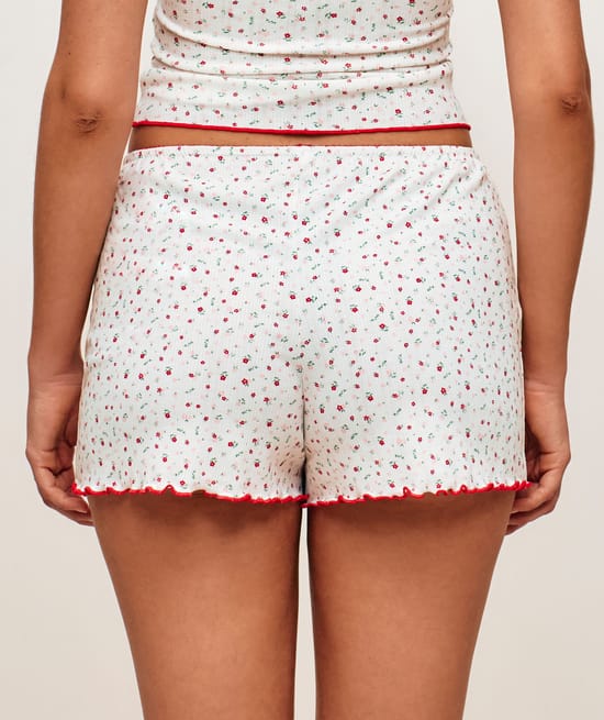Jersey shorts with flower patterns;