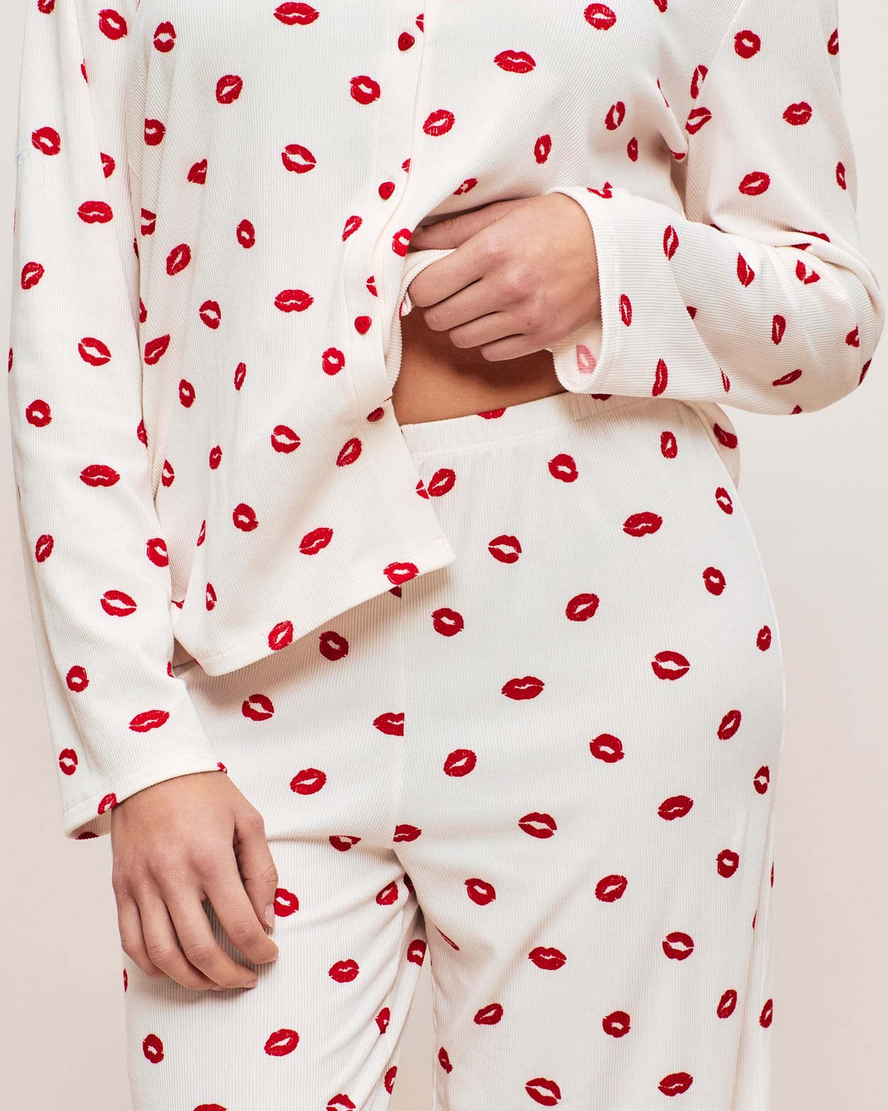 Ribbed jersey trousers with lip pattern;