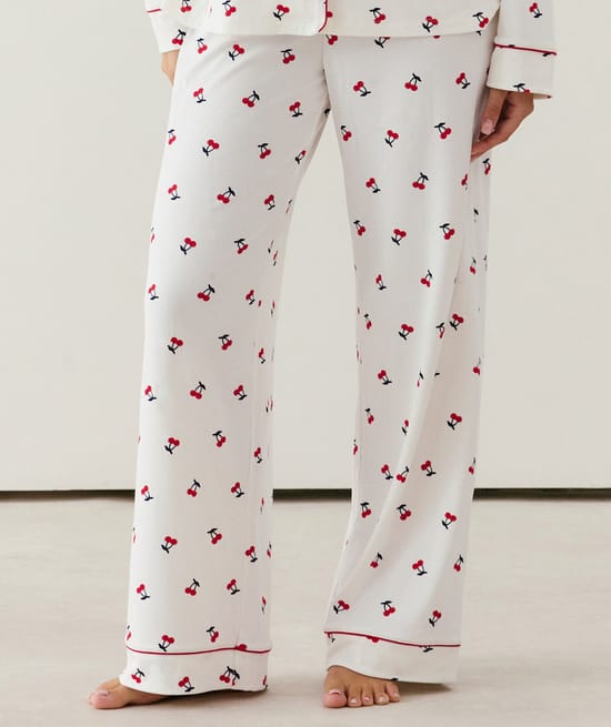 Ribbed jersey trousers with cherry pattern;