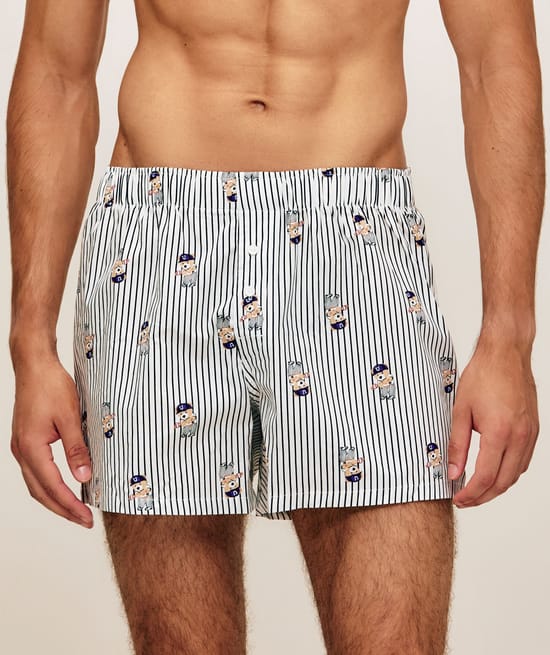 Striped cotton boxer shorts with bear patterns;