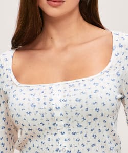 Pointelle top with flower pattern;