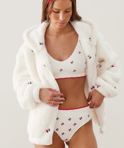 Sherpa jacket with cherry embroidery;